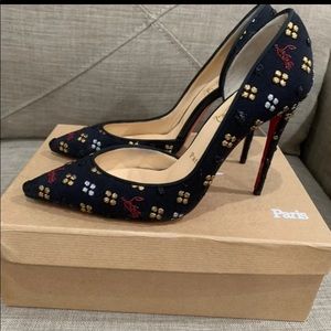 Chiristian louboutin shoes, red botton